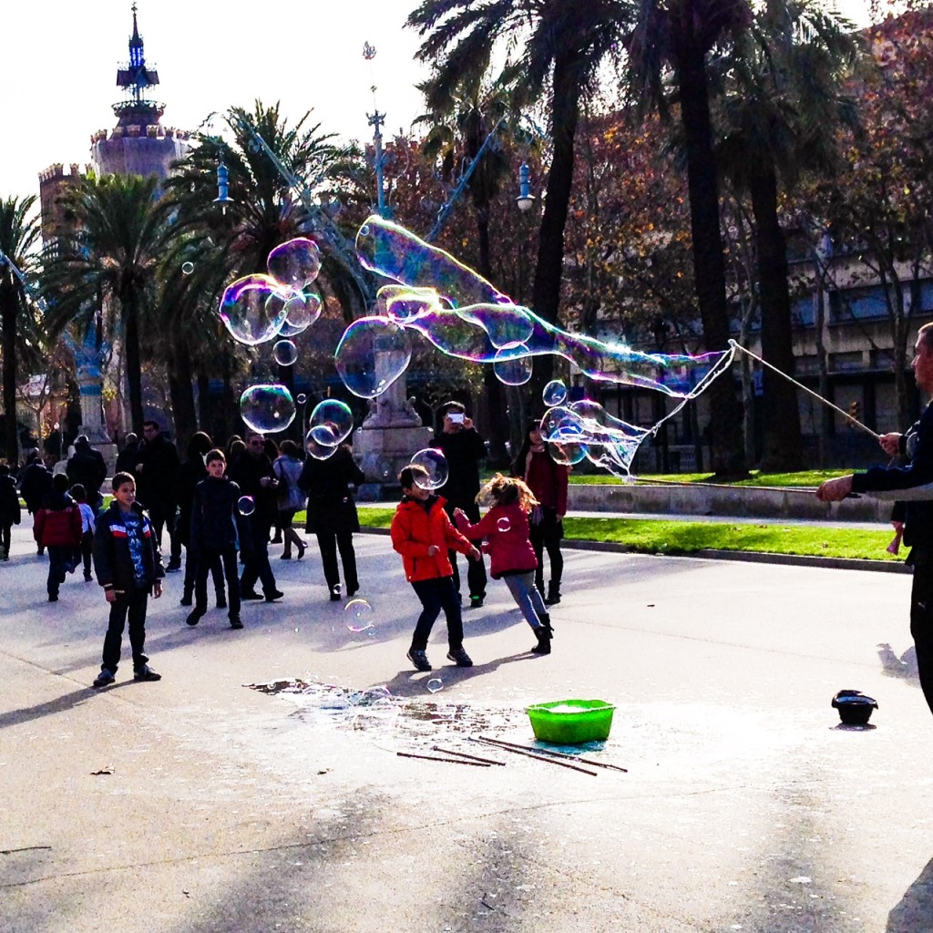 Kids running after bubbles. I loved watching this. :))