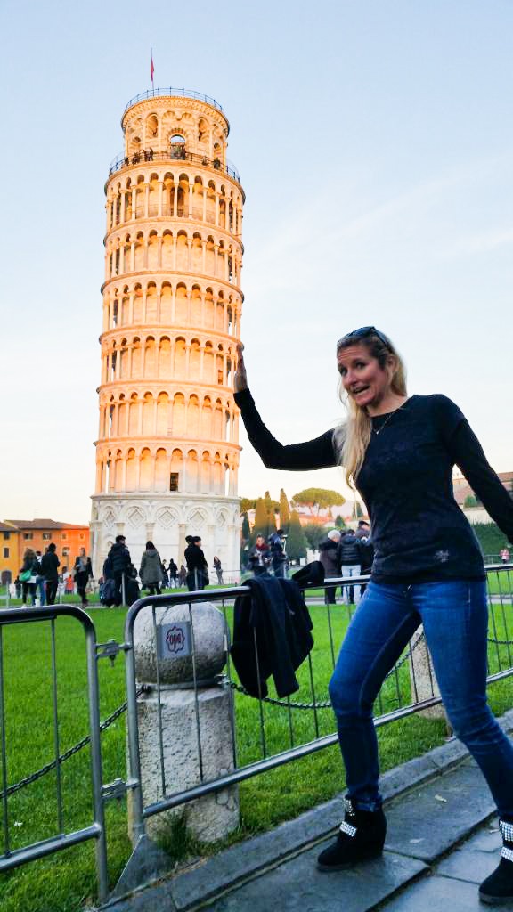 Classic pic! What's hilarious, is EVERYONE there is standing in these funny positions trying to get their own classic pic holding up the Tower. Totally hilarious, totally worth it. #DOIT