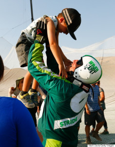 SIMI VALLEY, CA - JULY 30: Skydiver Luke Aikins celebrates with son Logan after jumping 25,000 feet from an airplane without a parachute or wing suit as part of 'Stride Gum Presets Heaven Sent' on July 30, 2016 in Simi Valley, California. (Photo by Mark Davis/Getty Images for Stride Gum)